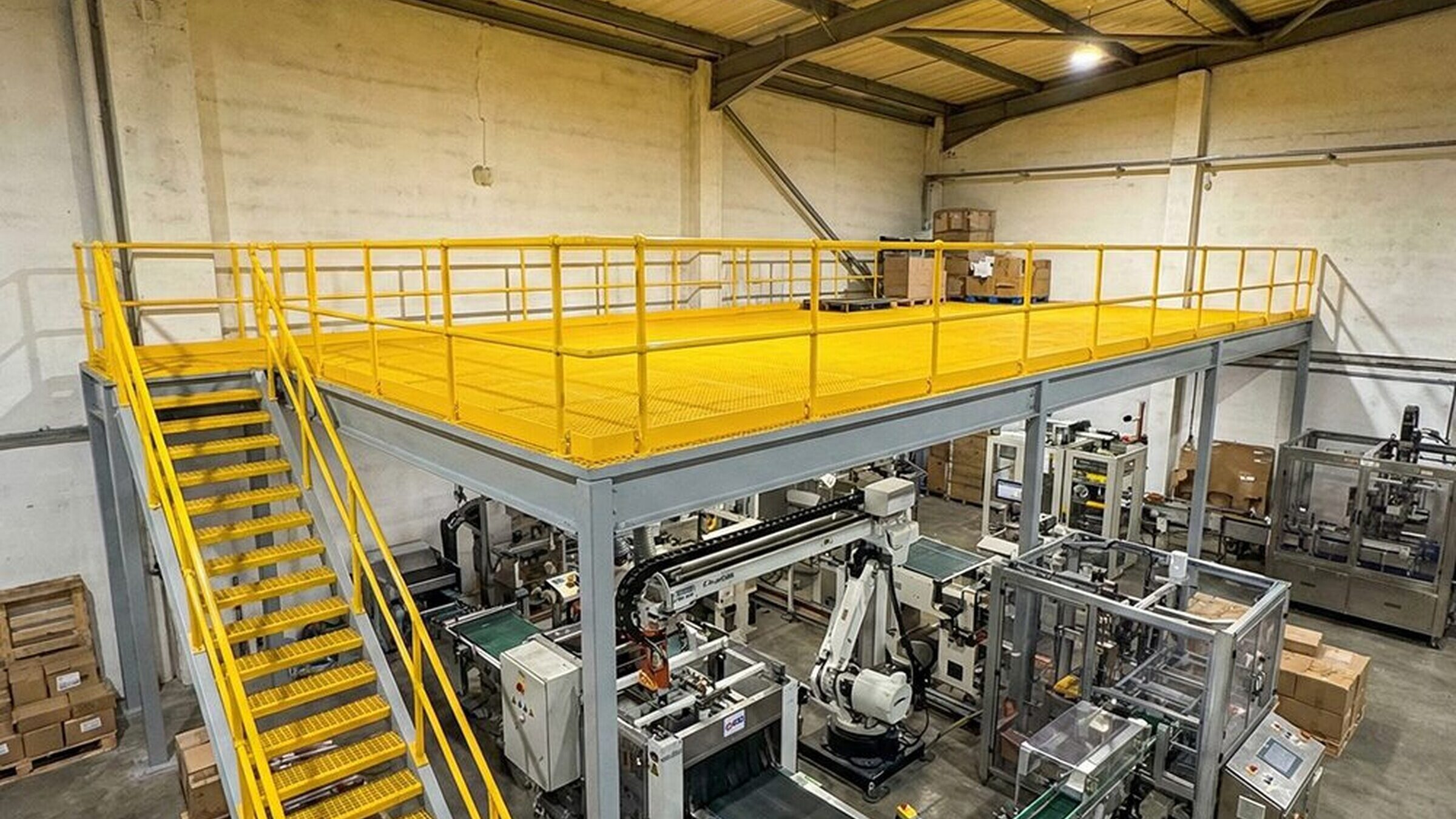 Large GRP mezzanine floor and access staircase on a steel frame