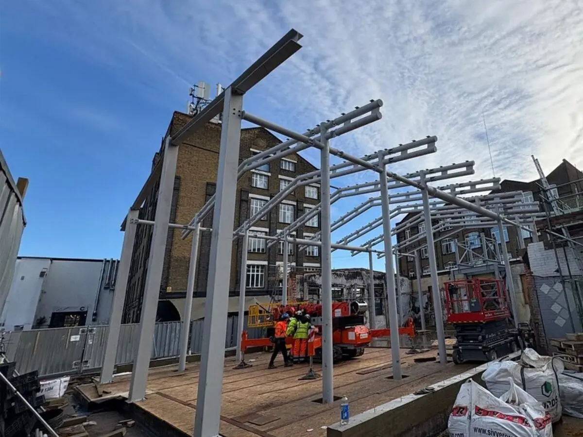 large portal frame building erection london december 2025